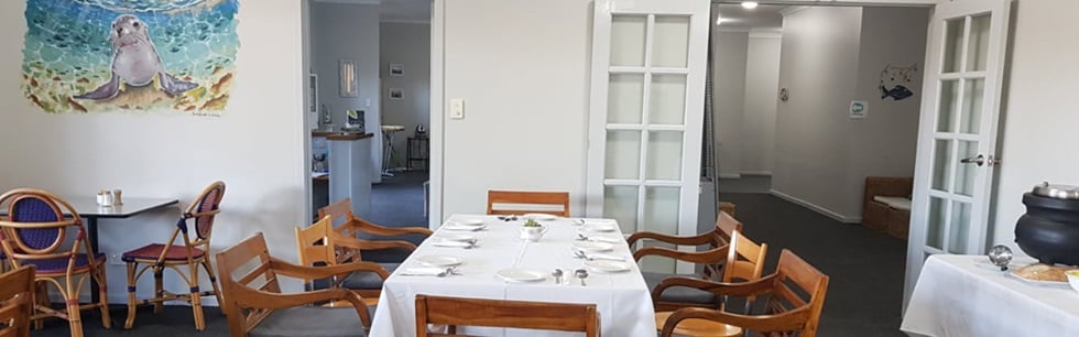 Restaurant dining room with tables ready for guests