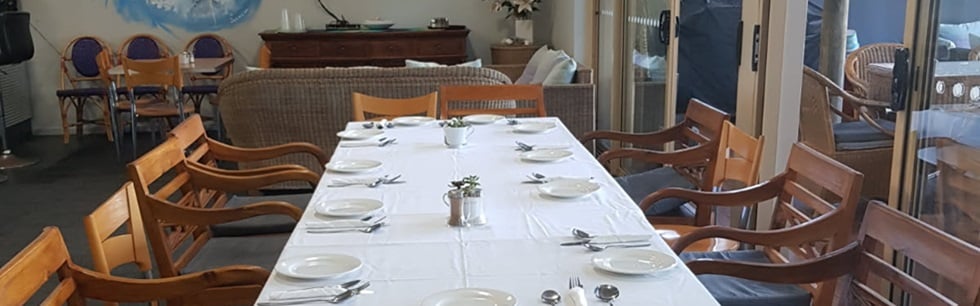 Long dining table set at Centre Break Restaurant